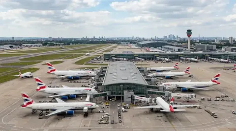 Aircraft parked at the terminals at Heathrow Airport